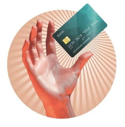 Credit cards arranged on a world map with passport